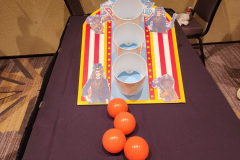 Game 3: A mini skeeball decorated with images of two villains who recently appeared in the Japanese version of the game, but have not yet debuted in the English server