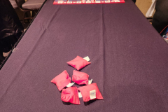 Game 6: A bean bag toss where the targets are all different pictures of the school's often irresponsible headmaster, Dire Crowley